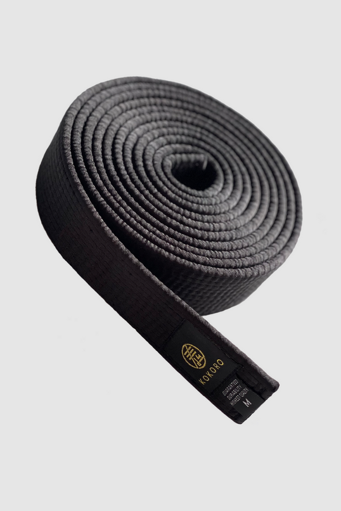 Critical kuro obi for karate and taekwondo by Tamashii Kokoro. High quality black belt. Shiny, glossy, smooth finish.